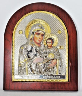 Elegant small icon of Mother of God (metal in wooden frame)